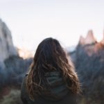 woman in front of mountain